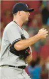  ?? JEFF ROBERSON/AP ?? Yankees relief pitcher Clay Holmes pauses on the mound after giving up a two-run double to the Cardinals’ Paul DeJong in the eighth inning Friday in St. Louis.