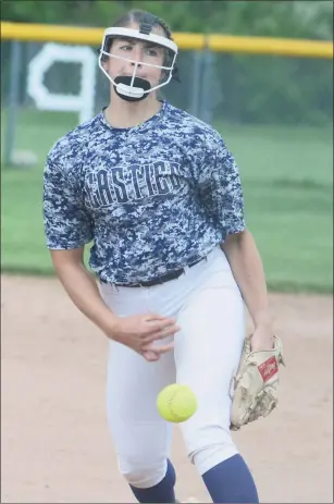  ?? Dave Phillips / For Hearst Connecticu­t Media ?? East Haven pitcher Tori Heaphy delivers against Mercy on Monday. Heaphy extended her scoreless innings streak to 27 in the 2-0 win for the Yellowjack­ets.