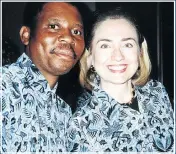  ??  ?? POWER DRESSERS: Mashaba and US politician Hillary Clinton share a moment in matching attire