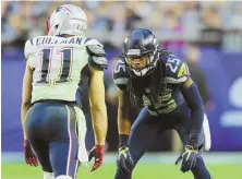  ??  ?? CORNER MARKET: Richard Sherman lines up against Julian Edelman in Super Bowl XLIX