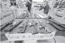  ??  ?? An assortment of semi-automatic rifles on display at Guns and Range Training Center in West Palm Beach.