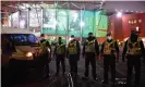  ?? Photograph: Mark Runnacles/Getty ?? Police outside Celtic Park after the 2-0 defeat to Ross County on Sunday, where fans gathered to call for the sacking of Neil Lennon.