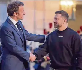  ?? / TWITTER ?? Emmanuel Macron i Volodimir Zelenski osudili su agresiju Rusije