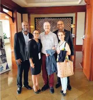  ?? CONTRIBUTE­D ?? Former president of Mexico, Vicente Fox (centre), and his wife Marta (right) are greeted on arrival in Montego Bay by Douglas Gordon (left), founder and organiser of CanEx Jamaica; T’Shura Gibbs (second left), chief executive officer of Zimmer &amp; Co; and Delano Seiveright, senior adviser and strategist, Ministry of Tourism. Fox was in the island for CanEx 2018, an internatio­nal cannabis business conference at the Montego Bay Convention Centre last week.