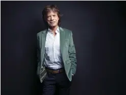  ?? Associated Press ?? ■ Mick Jagger of the Rolling Stones poses for a portrait in New York. The Rolling Stones frontman, who will tour America next spring with his iconic band, says live shows give him a rush that can’t be matched.