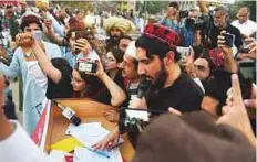  ?? AFP ?? Leader of the PTM Manzoor Pastheen speaks during the rally in Lahore.