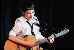  ??  ?? School days Gary showed promise as a musician as youngster at a Calderglen High talent show