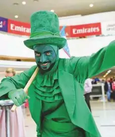  ?? Arshad Ali/Gulf News ?? An artist performs during the Dubai World Cup at the Meydan Racecourse yesterday.