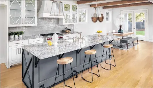  ?? CTW FEATURES ?? Countertop­s can be focal points in a kitchen.