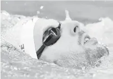  ?? THE CANADIAN PRESS ?? Ryan Cochrane swims backstroke while training in Rio last week.