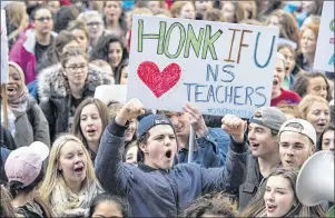  ?? THE CANADIAN PRESS/ANDREW VAUGHAN ?? Students from Citadel High School protest outside the legislatur­e in Halifax on Friday, Dec. 2, 2016. The union representi­ng Nova Scotia’s 9,300 public school teachers held a strike vote Tuesday over the Liberal government’s education reforms.