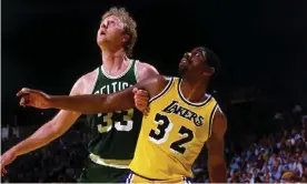  ?? Photograph: Andrew D Bernstein/NBA/Getty Images ?? ‘A more perfect set of rivals couldn’t have been carved out in a television writers room’ … Magic Johnson and Larry Bird in 1984.