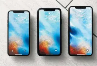  ?? AP PHOTO/RICHARD DREW ?? From left, the iPhone XS, iPhone XR, and iPhone XS Max are seen in New York in 2018.