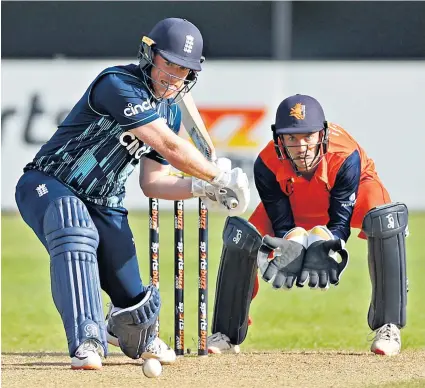  ?? ?? Concern: The England captain, Eoin Morgan, prepares to strike but is caught out off the part-time off-spin of Tom Cooper for a duck