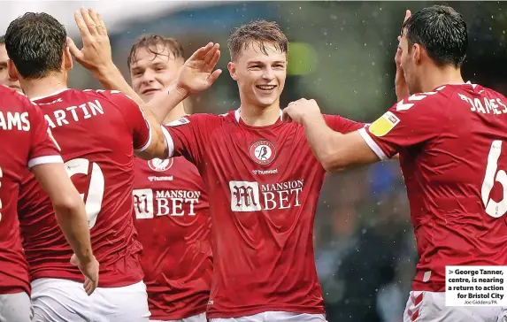  ?? Joe Giddens/PA ?? George Tanner, centre, is nearing a return to action for Bristol City