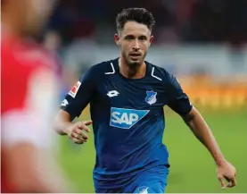  ??  ?? In this Sept. 9, 2017 file photo Hoffenheim's Mark Uth runs during a German first division Bundesliga match between TSG 1899 Hoffenheim and Bayern Munich in Sinsheim, Germany. Uth’s brilliant start to the season could yet earn the Hoffenheim forward a...