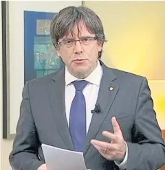  ?? REUTERS ?? Sacked Catalan president Carles Puigdemont makes a statement calling for the release of ‘the legitimate government of Catalonia’ on Thursday.