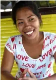  ??  ?? Typhoon Haiyan survivor, Emilie Ortega smiling during an interview with AFP in Bacoor town, Cavite province, west of Manila. — AFP photo