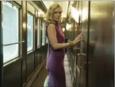  ??  ?? This image released by Twentieth Century Fox shows Michelle Pfeiffer in a scene from, “Murder on the Orient Express.”