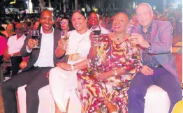  ?? ?? From left: State Minister in the Ministry of Culture, Gender, Entertainm­ent and Sport, Alando Terrelonge; his wife, Racquel Leslie; Minister of Culture, Gender, Entertainm­ent and Sport Olivia ‘Babsy’ Grange; and Chief Executive Officer of Visualvibe Jamaica Limited Ali McNab raise a toast during Deniece Williams’ performanc­e at the sold-out Red Rose For Gregory Mother’s Day Concert at Hope Gardens last Sunday.