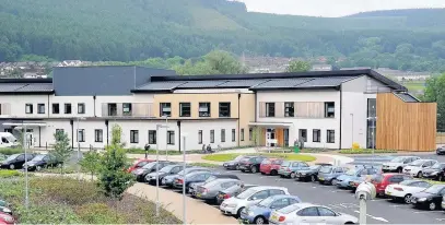  ??  ?? Staff at Ysbyty Cwm Cynon, Mountain Ash, above, have written a book of poems entitled Reflection­s On Care, inset