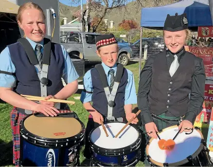  ??  ?? The Devery siblings, from left, Kirsten, 17, Peter, 13, and Hannah, 18, will be playing at the New Zealand Pipe Band Championsh­ips in Invercargi­ll on Friday and Saturday.