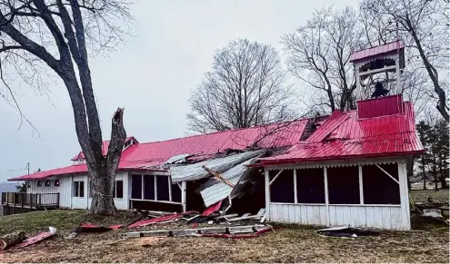  ?? Kenneth C. Crowe Ii/times Union ?? The damage caused by a March windstorm can be seen to the Martyrs Chapel at the Our Lady of Martyrs Shrine in Auriesvill­e.