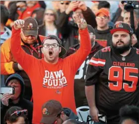  ?? TIM PHILLIS — THE NEWS-HERALD ?? A fan reacts during the Browns’ draft party on April 26 in Cleveland.