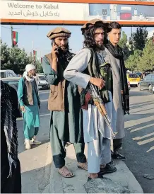  ??  ?? AN ARMED member of the Taliban stands guard outside Hamid Karzai Internatio­nal Airport in Kabul, Afghanista­n, last month. | REUTERS