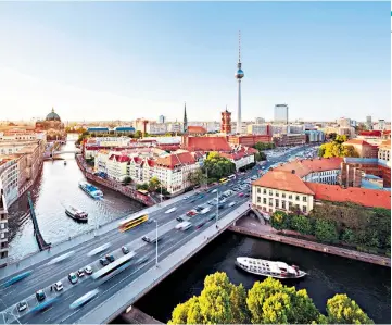  ??  ?? ON THE MOVE
Berlin, with boats on the river Spree and the television tower dominating the skyline, impressed one of our readers