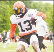  ?? Getty Images ?? Browns wide receiver Odell Beckham Jr. catches a pass during a minicamp practice on June 4 in Berea, Ohio.