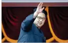  ?? AP 2016 ?? Reclusive North Korean leader Kim Jong Un waves at parade participan­ts in Pyongyang.