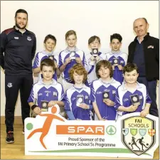  ??  ?? St Patrick’s National School, Slane, Boys Section B runners-up in the Meath region, with Tim Clancy (Drogheda United manager) and Noel Conway (SPAR, mainsponso­rs of the FAI Five-a-Side competitio­n).