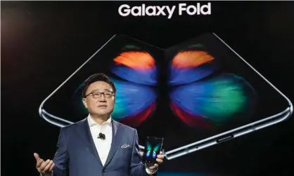  ?? Photograph: Samsung Electronic­s/EPA ?? Samsung unveils the Galaxy Fold, the foldable smartphone, in San Francisco on 20 February.