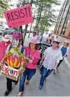  ?? Tribune News Service file photo ?? Protesters and members of Code Pink gather outside a meeting of Exxon Mobil shareholde­rs in Dallas in 2017.