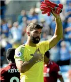  ??  ?? Goalkeeper Alisson gave Liverpool fans a few heart flutters in his team’s win over Leicester City.