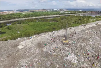  ?? SUNSTAR FOTO / ALLAN CUIZON ?? RECENT DISCOVERY. The Cebu City Government just learned that the 15-hectare Inayawan Landfill was part of a 28-hectare titled property under the name of Renato Senining.