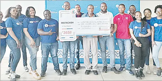  ?? (Pic: Machawe Fakudze) ?? InstaCash and Lubombo FA officials with the E120 000 sponsorshi­p replica cheque.