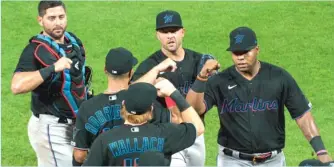  ?? CHRIS SZAGOLA/AP ?? The Marlins have had 15 players and two staff members test positive for COVID-19.