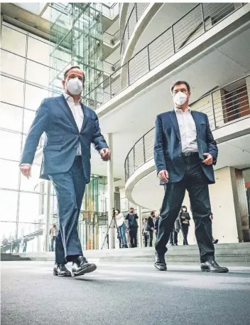  ?? FOTO: MICHAEL KAPPELER/DPA ?? Es kann nur einen geben: Armin Laschet (l.) und Markus Söder im Bundestag.