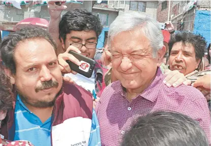  ??  ?? El líder del Movimiento de Regeneraci­ón Nacional, durante un mitin en Naucalpan.