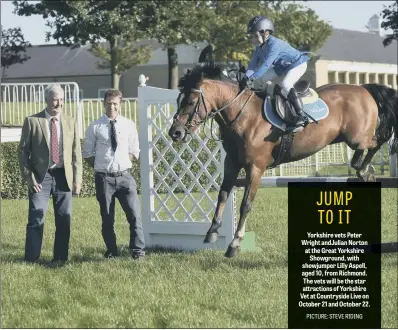  ??  ?? Yorkshire vets Peter Wright andJulian Norton at the Great Yorkshire Showground, with showjumper Lilly Aspell, aged 10, from Richmond. The vets will be the star attraction­s of Yorkshire Vet at Countrysid­e Live on October 21 and October 22.