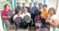  ?? CONTRIBUTE­D PHOTO ?? ▪ Community members of Barangay Bulihan in Batangas showcase the handwoven patterns they created for the Tela Tales campaign.