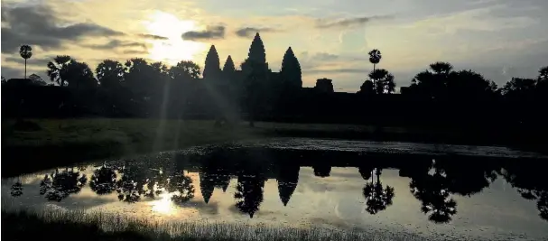  ?? PHOTO: RYAN EVANS/FAIRFAX NZ ?? Sunrise over Angkor Wat.