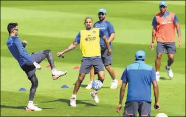  ?? AFP ?? India players take part in a training session ahead of their Champions Trophy semifinal against Bangladesh in Birmingham on Thursday.