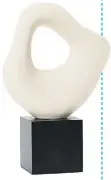  ??  ?? Sculpture H&M £24.99
Vase Marks & Spencer £15