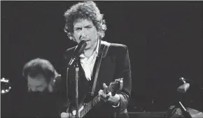  ?? Jeff Robbins / Associated Press ?? Transcript­s of lost 1971 Dylan interviews with the late American blues artist Tony Glover and letters the two exchanged reveal that Dylan changed his name from Robert Zimmerman because he worried about anti-Semitism.