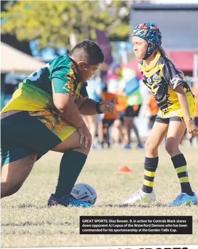  ??  ?? GREAT SPORTS: Diaz Bowen, 9, in action for Centrals Black stares down opponent AJ Lepua of the Waterford Demons who has been commended for his sportsmans­hip at the Gorden Tallis Cup.