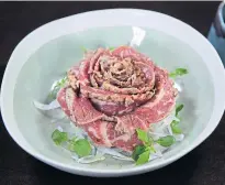  ??  ?? The rose beef, carpaccio with a delicate Japanese touch.