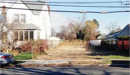  ??  ?? WEST HEMPSTEAD, New York: In this Nov 25, 2015 photo, a lot stands empty after the township had the home that once stood on it torn down. — AP